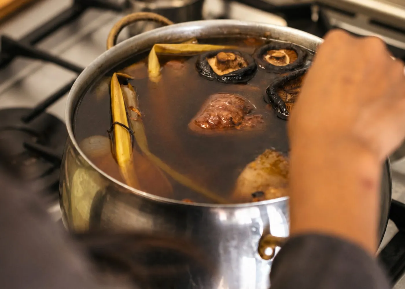Bones and herbs simmering gently in a large stockpot